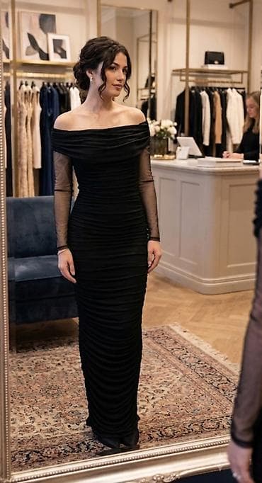 Elegantna crna večernja haljina – duga, pripijena silueta sa