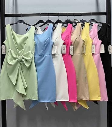 til sa cirkonima: Kratka elegantna haljina bez rukava sa upečatljivim detaljem na — 3