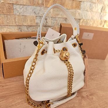 mona torbe polovne: Kožna torba-buket (bucket bag) u boji slonovače sa zlatnim detaljima — 1