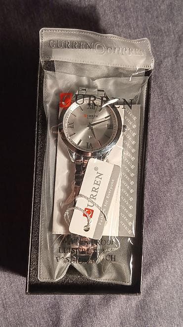 binatone sat nav: Nov ženski sat od nerdjajućeg čelika. Kvarcni mehanizam, ima datum — 10