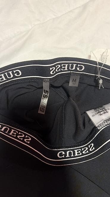 pantalone helanke duzina cm: GUESS ženske helanke – crne - Model sa elastičnim pojasom u — 4