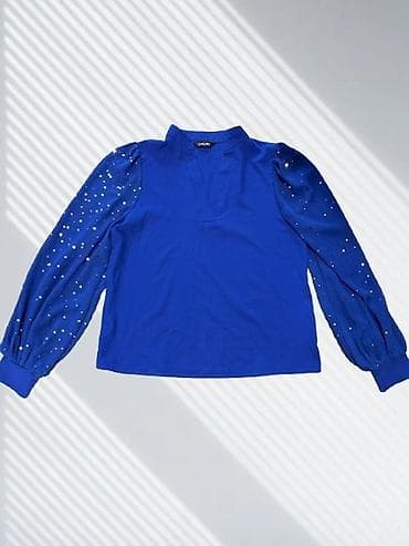 Elegantna ženska bluza sa nitnama na rukavima na lalafo.rs Elegantna ženska bluza sa nitnama na rukavima