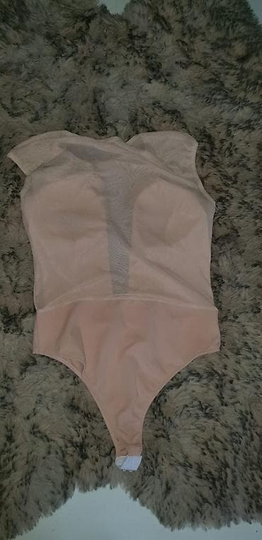 bonatti donji veš: Elegantan ženski bodi bez rukava u puder‑roze boji. Gornji deo je od — 2