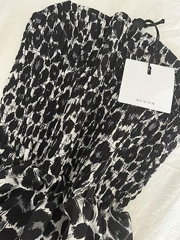 muska odela krusevac: Haljina bez bretela sa leopard printom - Model: duga, lepršava — 2