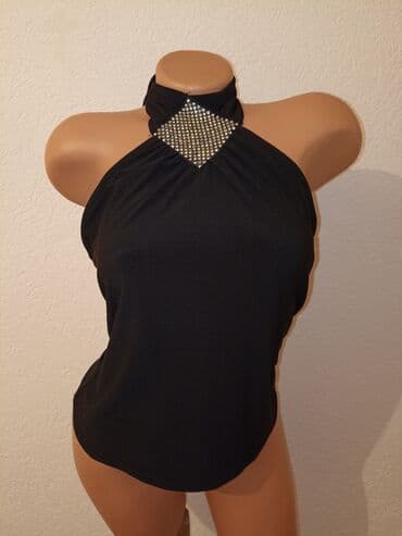 triple s: Kao nova majica, ima elastina.Velicina M — 1