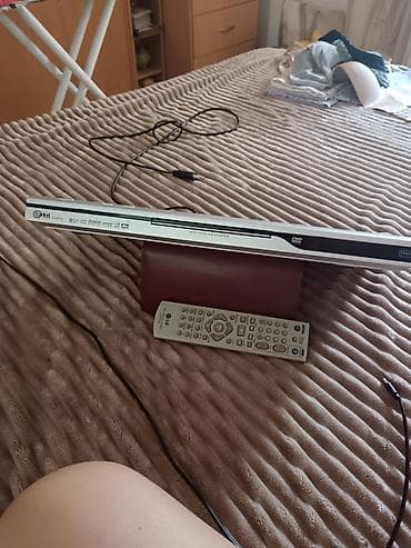 LG DVD plejer sa daljinskim upravljačem. ISPRAVNO - Model: LG