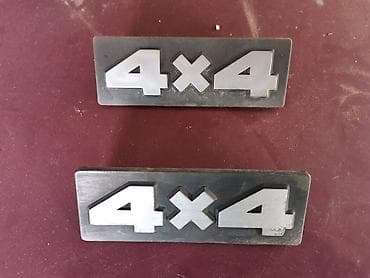 Znak 4x4 zadnjeg krila Lada 21213,21214 Niva br.2. Polovna, ocuvana