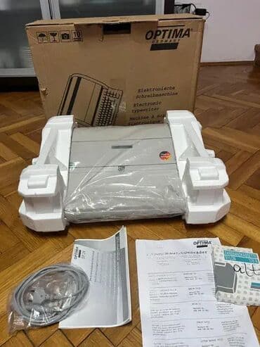 cena srpski dukat: *** SUPER AKCIJA *** #2782 Elektronska pisaća mašina Optima SP 24; — 5