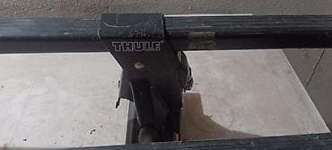 Thule krovni nosači – set od dve uzdužne šine sa nogama/držačima -