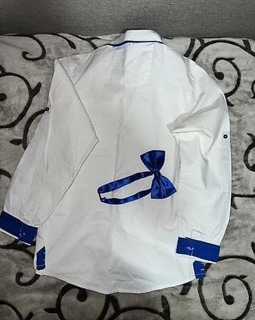 kosulje konstantin: Bela košulja sa leptir mašnom
S velicina — 2