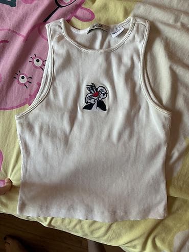 bunda broj: Beli rebrasti ženski top bez rukava, brenda X-Side, veličina M. Kratak — 1