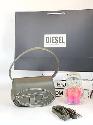 python kaisevi cene: Diesel ženska torba – model sa prepoznatljivim ovalnim logoom napred — 8