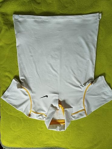 lutke sa kosom: Original.Nike majca sa slika. Jednom nosena.Nike Dri-FIT polo majica — 2