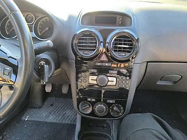 Delovi enterijera: CD PLAYER ZA OPEL CORSA D | Cd Player za Opel Corsu D ===== ŠIROK — 1