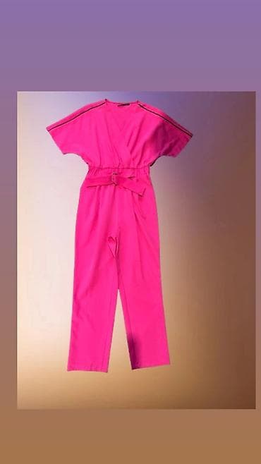 moderni zenski kompleti: Ženski kombinezon – jarko ružičaste boje
36-42 — 1