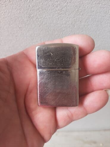 guess torbe na snizenju: Zippo lighter, Used — 2