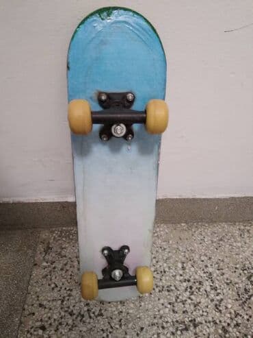 Trotineti, skejtbordovi i hoverbordovi: Skateboard dužine 60 cm, širine 15 cm. polovan,malo ostecen (Vidi — 2