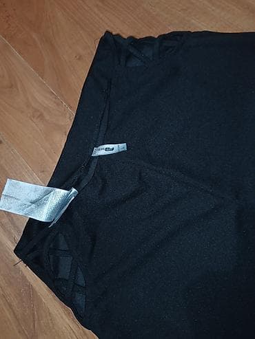 zenske cizme stefano: Crne ženske pantalone sa zvonastim nogavicama. - Veličina: L (oznaka — 1