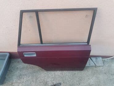 delovi auspuha: Vrata zadnja desna Lada 2104 Karavan(bordo). Skinuta sa rastavljenog — 2