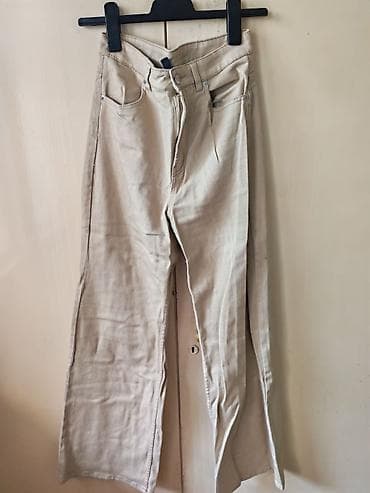 H&M ženske pantalone, model ravnog/šireg kroja u bež nijansi na lalafo.rs H&M ženske pantalone, model ravnog/šireg kroja u bež nijansi