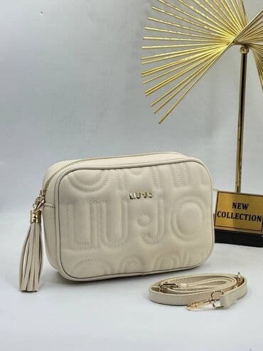 firmirane zenske tasne: Tasna 
23x17cm
pk — 2