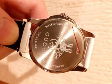 mona bele torbice: Classic watch, Gucci, Female — 7