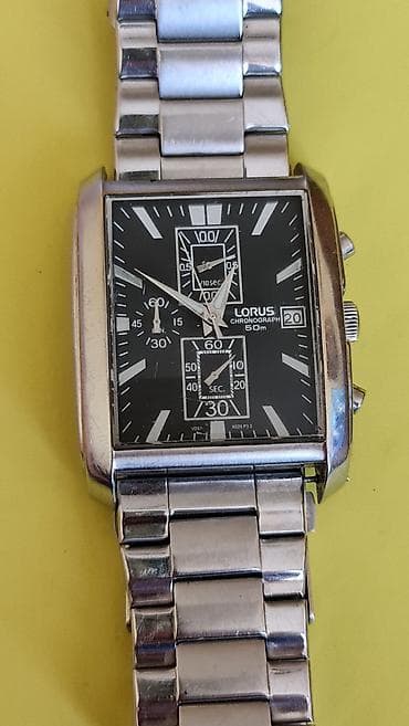 sat versace: **Lorus Chronograph 50m ručni sat** Prodaje se muški Lorus hronograf — 9