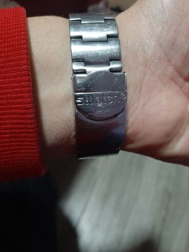 Jewellery: Swotch ispravan sat sat je original sviss made ima jednu linijicu sa — 4