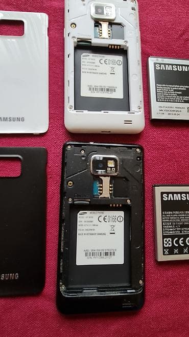 Mobilni telefoni: Samsung Galaxy S II (GT-I9100) – dva primerka, crni i beli. Ključne — 9