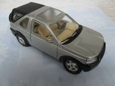 pločice i diskovi: Burago Land Rover Freelander1:24,nema TOCKOVE SA SLIKA i zadnje — 1