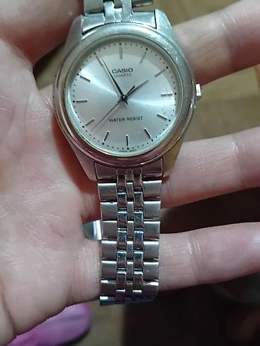 Casio ručni satovi – 2 komada 1) Casio Quartz, klasični analogni