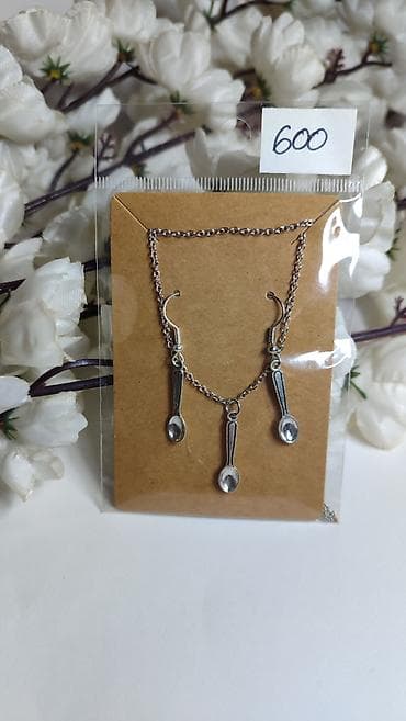 dzepni sat sa lancem: Set nakita sa motivom kašičica – ogrlica i minđuše. - Dizajn: sitne — 2