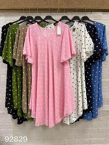 Dresses: Haljina sa tufnama – komforan A-kroj - Model: lepršava midi haljina — 3