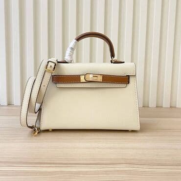 torbice new yorker: Elegantna ženska torba sa ručkom i kaišem za rame, u kombinaciji bež i — 1