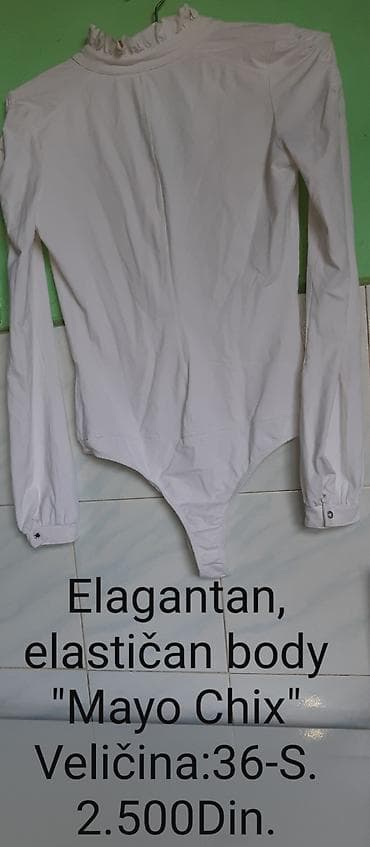 tigrovo oko: Mayo Chix beli bodi od likre, dugih rukava. Model sa volanima oko — 2