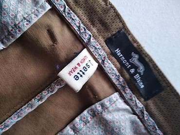kozne pantalone hm: Muške chino pantalone, bež/kaki boje, ravnog užeg kroja. - Materijal — 2