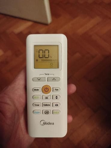 Mašine za šivenje: Daljinski za klimu Midea.Ispravan — 7