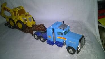 torbe sa sirokim kaisem: Matchbox kamion Peterbilt sa prikolicom i rovokopacem 33 cm,England — 1