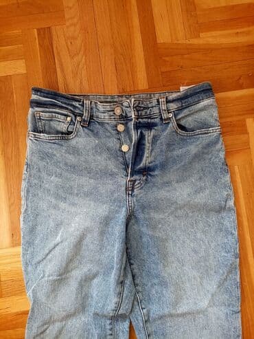 Ostala ženska odeća: Ženske farmerke od svetloplavog teksasa (stone wash), klasičan kroj sa — 2