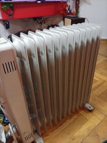 Donji delovi trenerke: Ulje­ni radijator na točkićima - Tip: električni uljni radijator sa — 7