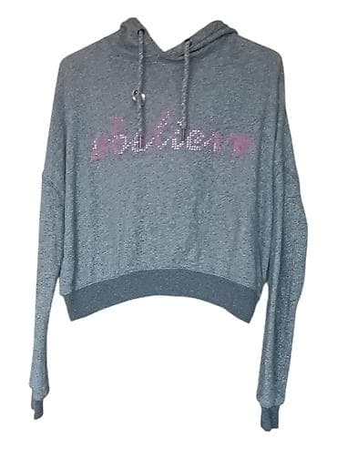 Siva ženska dukserica sa kapuljačom, kratkog (cropped) kroja. Napred na lalafo.rs Siva ženska dukserica sa kapuljačom, kratkog (cropped) kroja. Napred