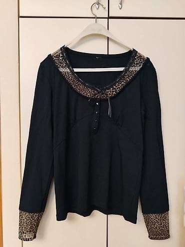 Ženska bluza sa dugim rukavima, crna, sa detaljima u leopard printu. -