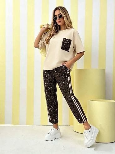 doca torbe: Komplet majica i trenerka sa animal print detaljima. -Majica oversize — 4