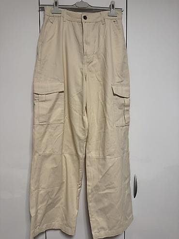 Bež cargo pantalone sa širokim nogavicama - Klasičan kroj sa ravnim na lalafo.rs Bež cargo pantalone sa širokim nogavicama - Klasičan kroj sa ravnim