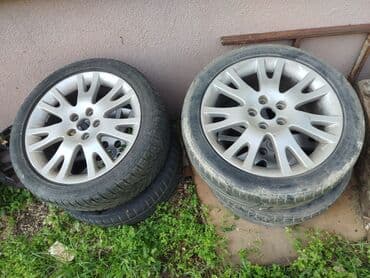 kuciste kljuca opel corsa c: Renault Laguna karavan, srebrne boje, sa krovnim nosačima. Poseduje — 4