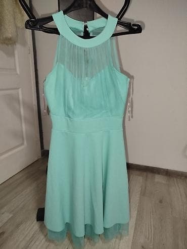 Muška odeća: Elegantna mint zelena haljina bez rukava, A-kroja. Gornji deo ima — 1