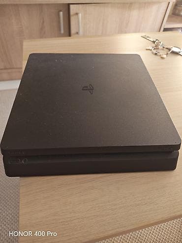 Sony PlayStation 4 Slim konzola (crna) - Model: PS4 Slim - Disk na lalafo.rs Sony PlayStation 4 Slim konzola (crna) - Model: PS4 Slim - Disk