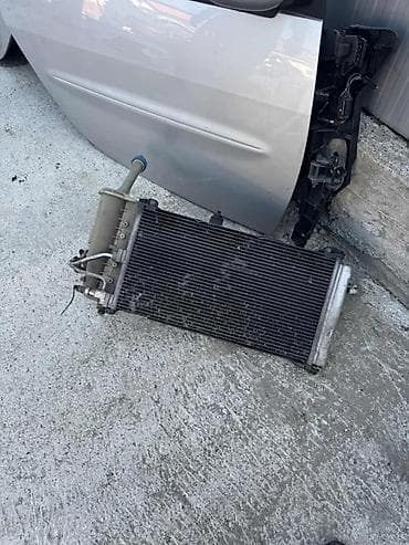 auto pojasevi rs: HLADNJAK VODE KLIME LANCIA Y | Hladnjak vode 25 Hladnjak klime 20 — 1