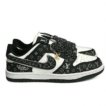 premiata crne muske patike: Patike niske siluete, crno–bele, sa monogram printom preko celog — 1