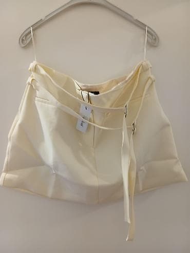 Elegantna krem mini suknja sa preklopom i kaišem - Model: mini suknja